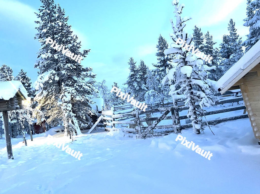 Snowy mountains with oranges houses